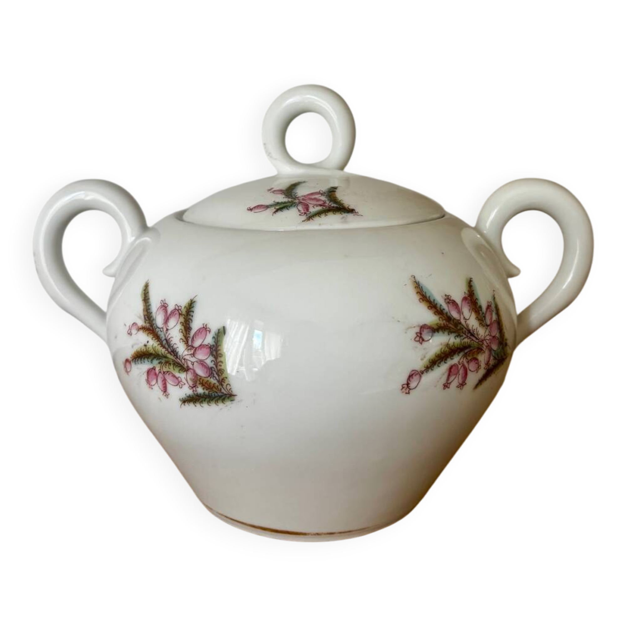 Beautiful vintage porcelain sugar bowl with a floral pattern.