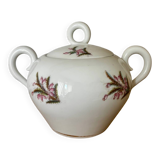 Beautiful vintage porcelain sugar bowl with a floral pattern.