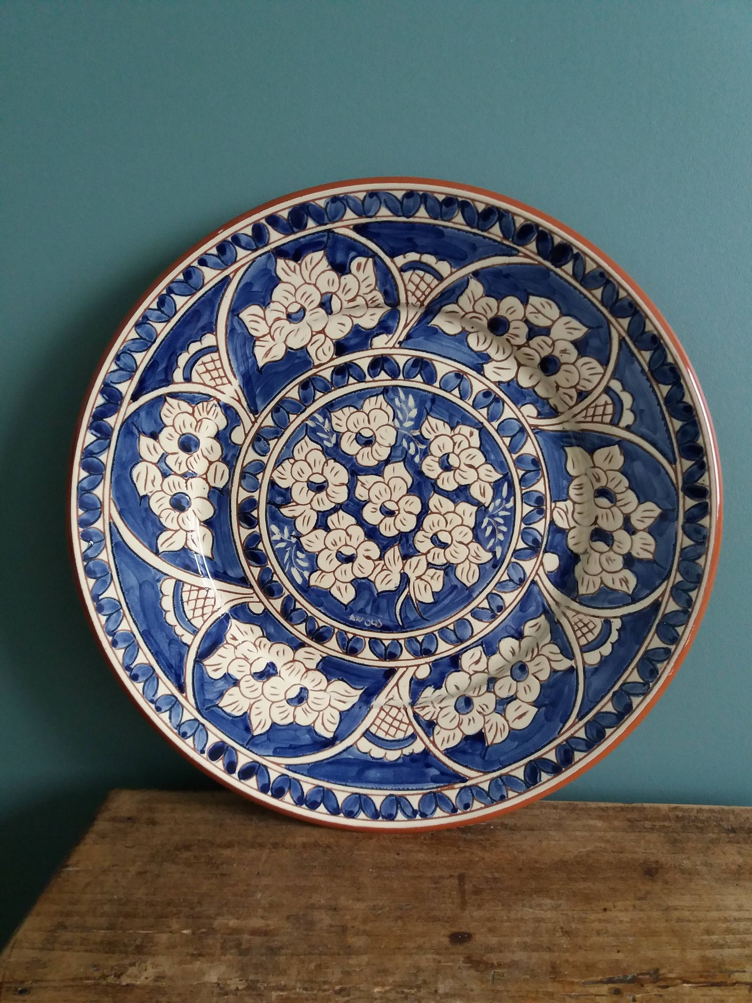 Plate signed Luis Janeiro, Portugal, enamelled terracotta plate
