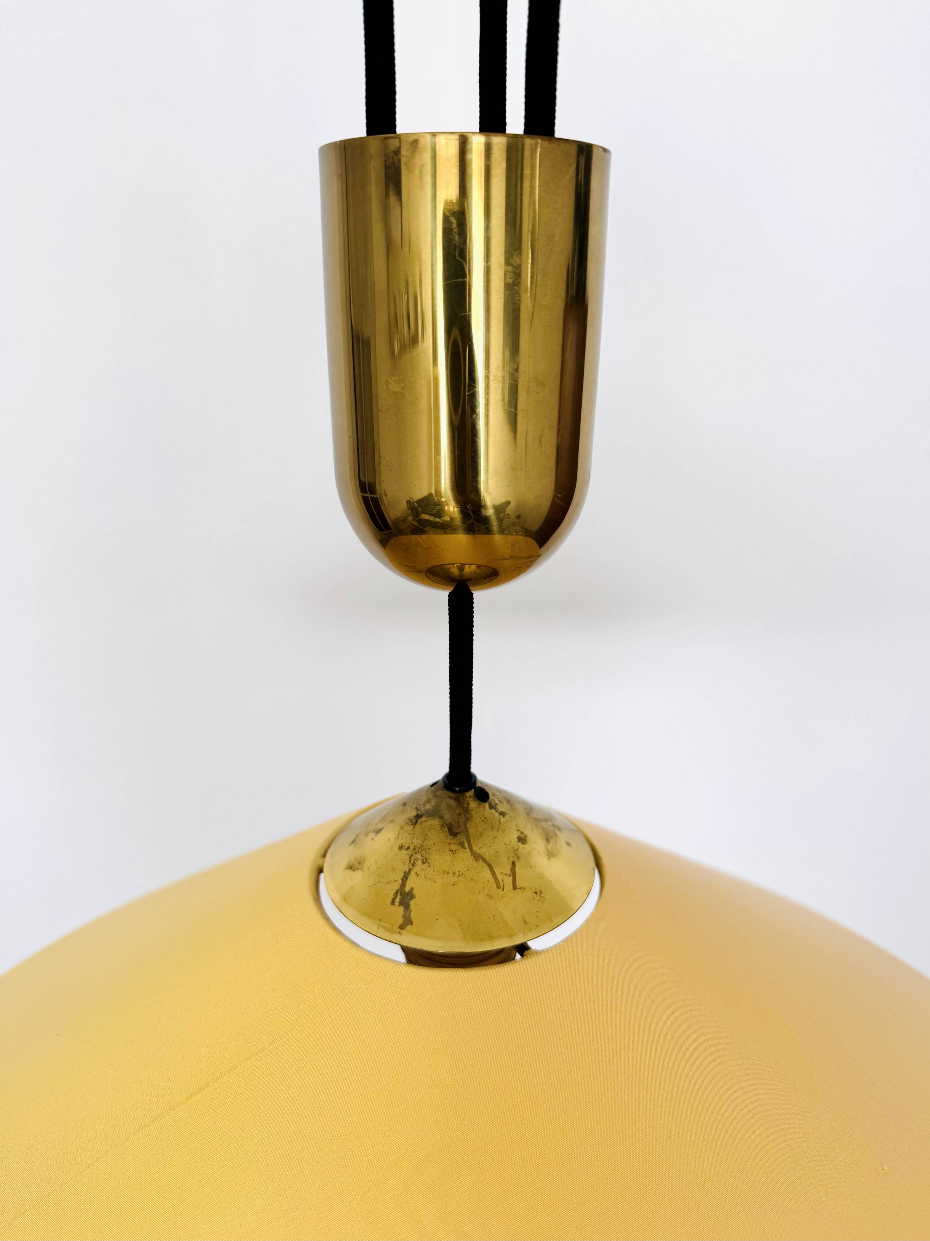 Adjustable Pendant Lamp with Counterweight by Florian Schulz