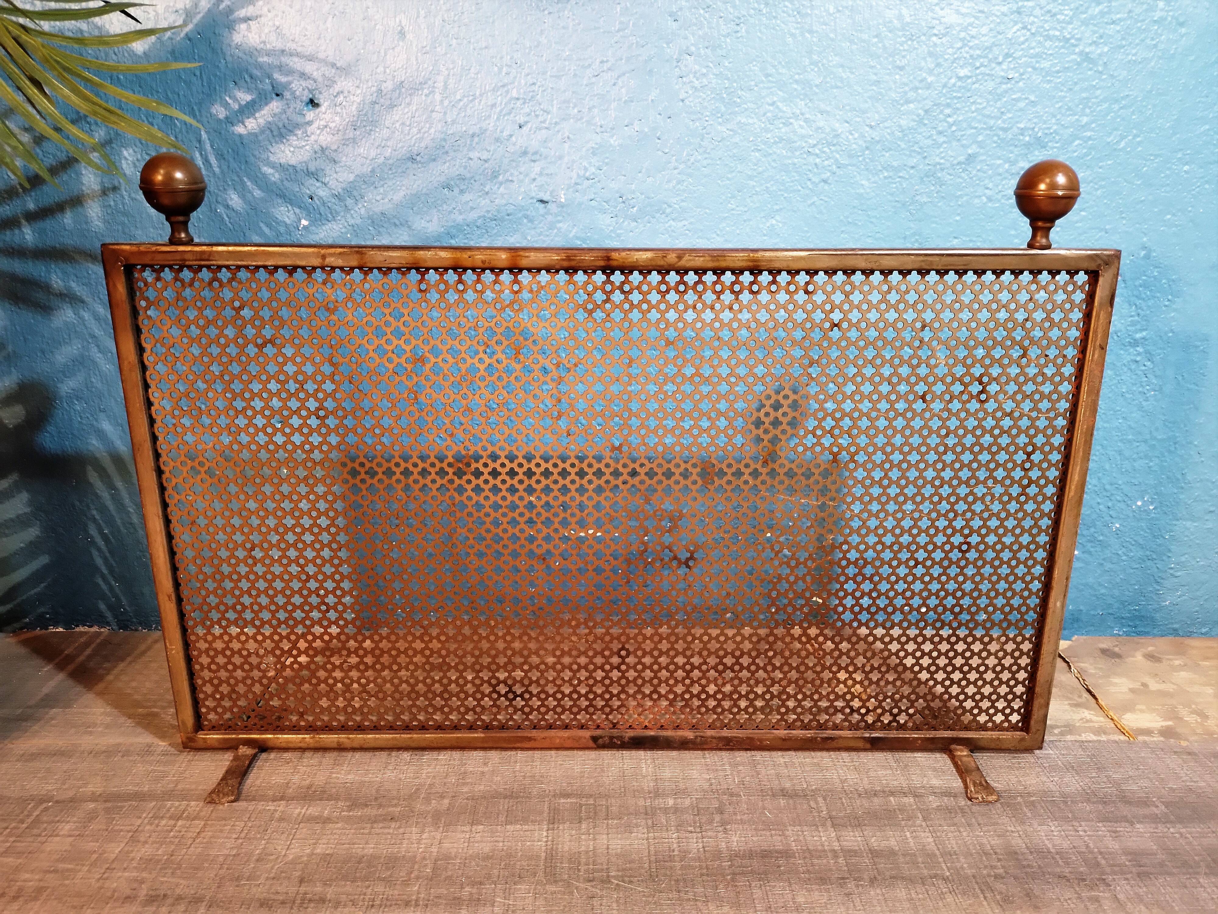 Perforated metal fire screen 1950s