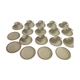 Cups and saucers in fine porcelain with gilded edging