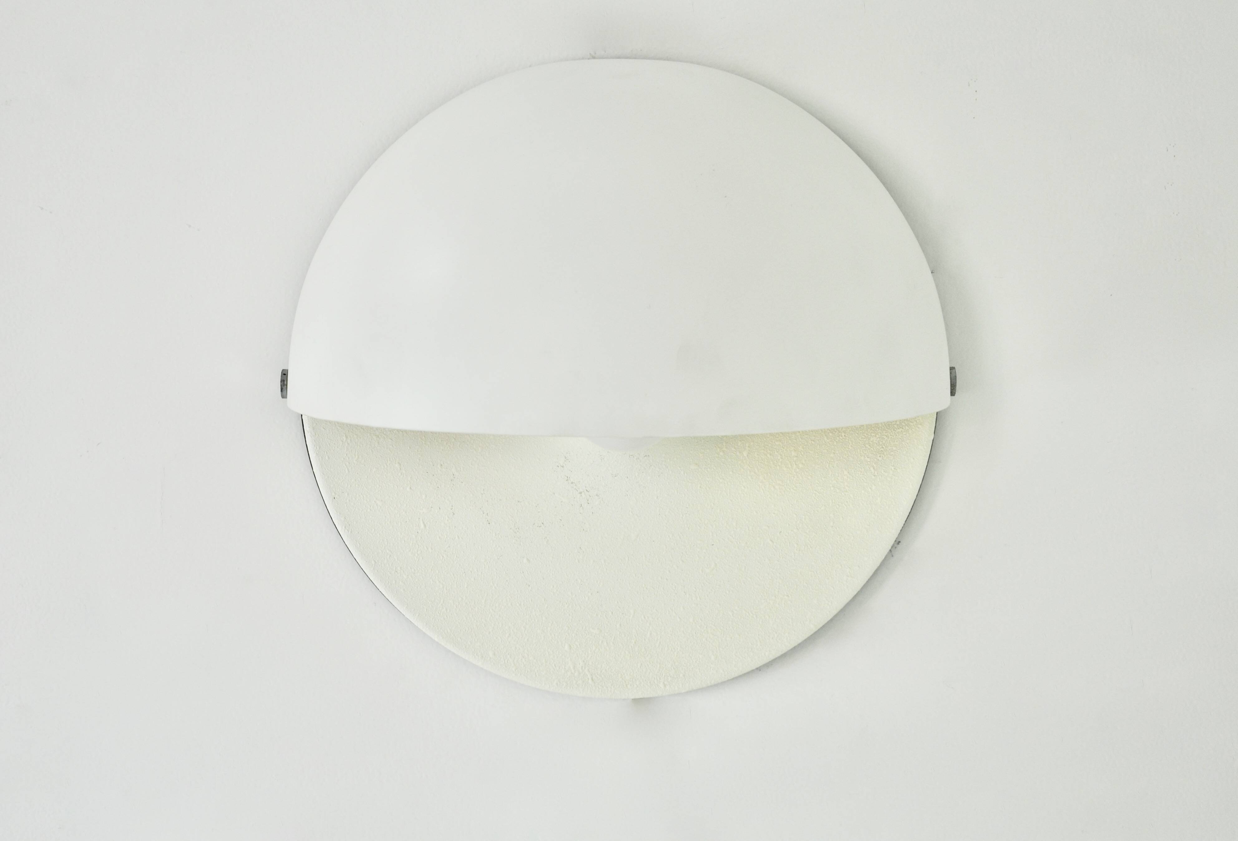 Large Mezzanotte wall lamp by Harvey Guzzini, 1970s