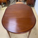 Louis XVl style round table in cherry with extensions
