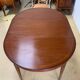 Louis XVl style round table in cherry with extensions