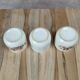 Set of 3 vintage ceramic cups with floral decoration.
