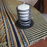 Spiral metal candle holder spring with candle, bronze appearance