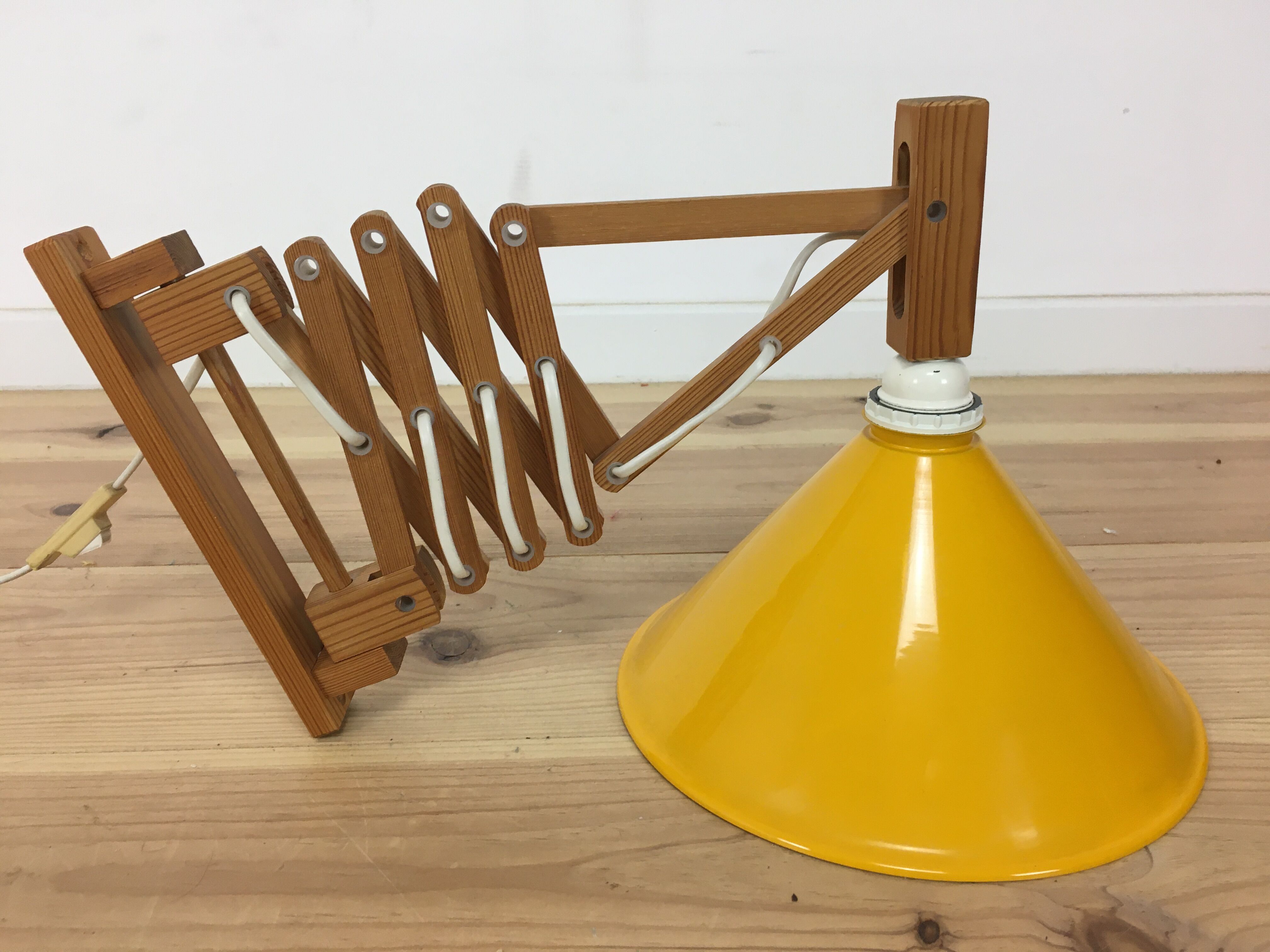 60s accordion sconce, pine, yellow metal reflector