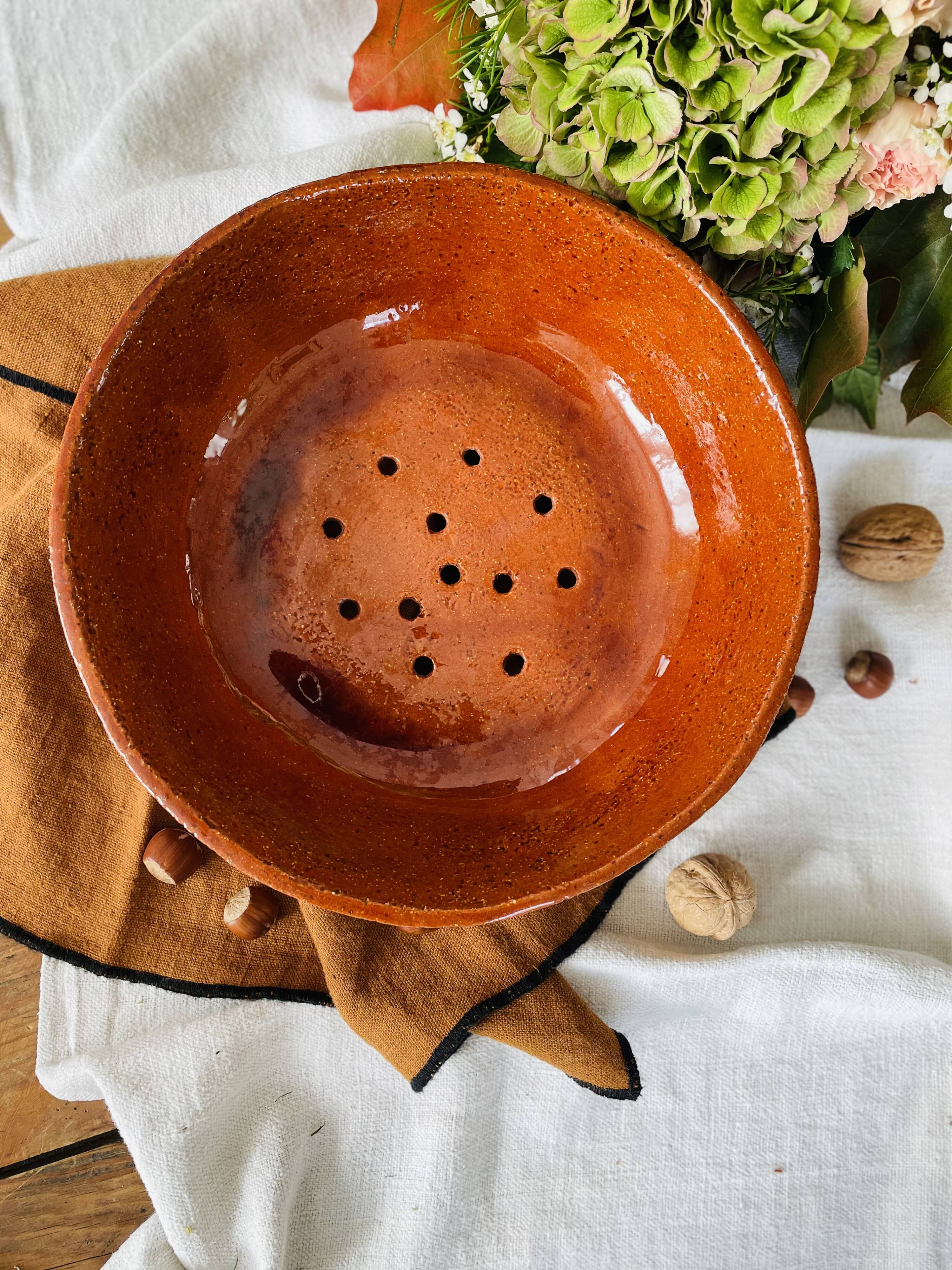 Vintage glazed terracotta strainer