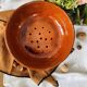Vintage glazed terracotta strainer