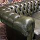 Chesterfield 2-seater green leather sofa from the 1980s