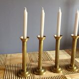 Series of 4 brass candlesticks