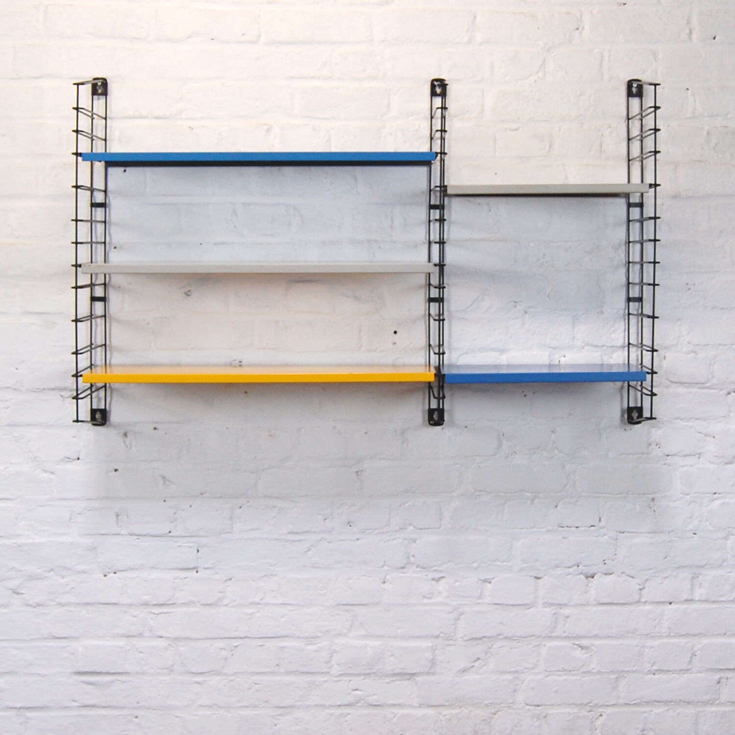 Vintage Tomado wall shelf by A. Dekker 1960s