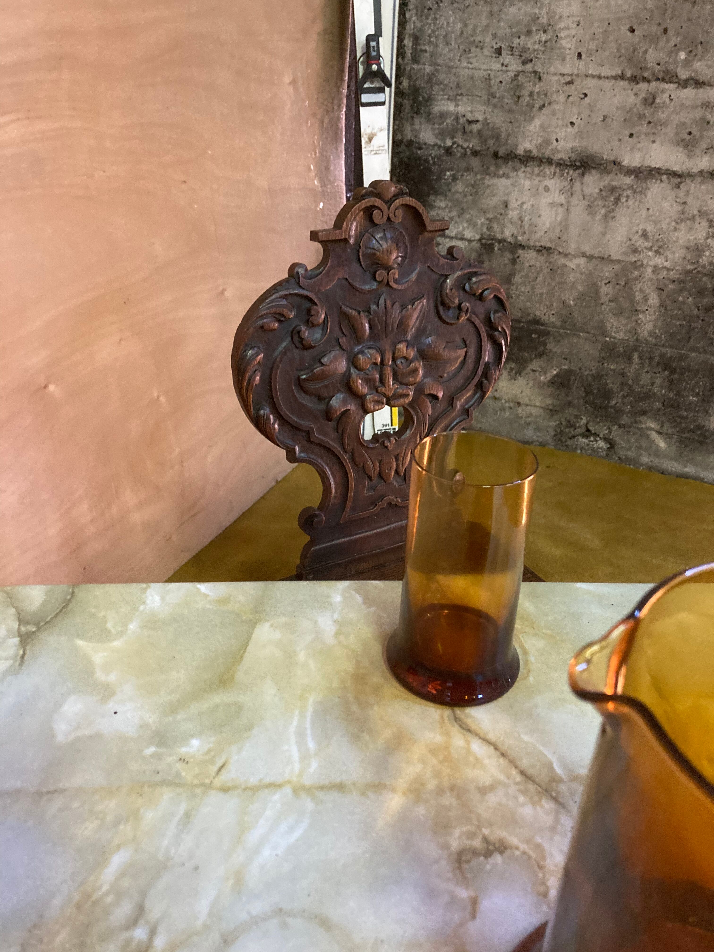 Duo of carved wooden chairs