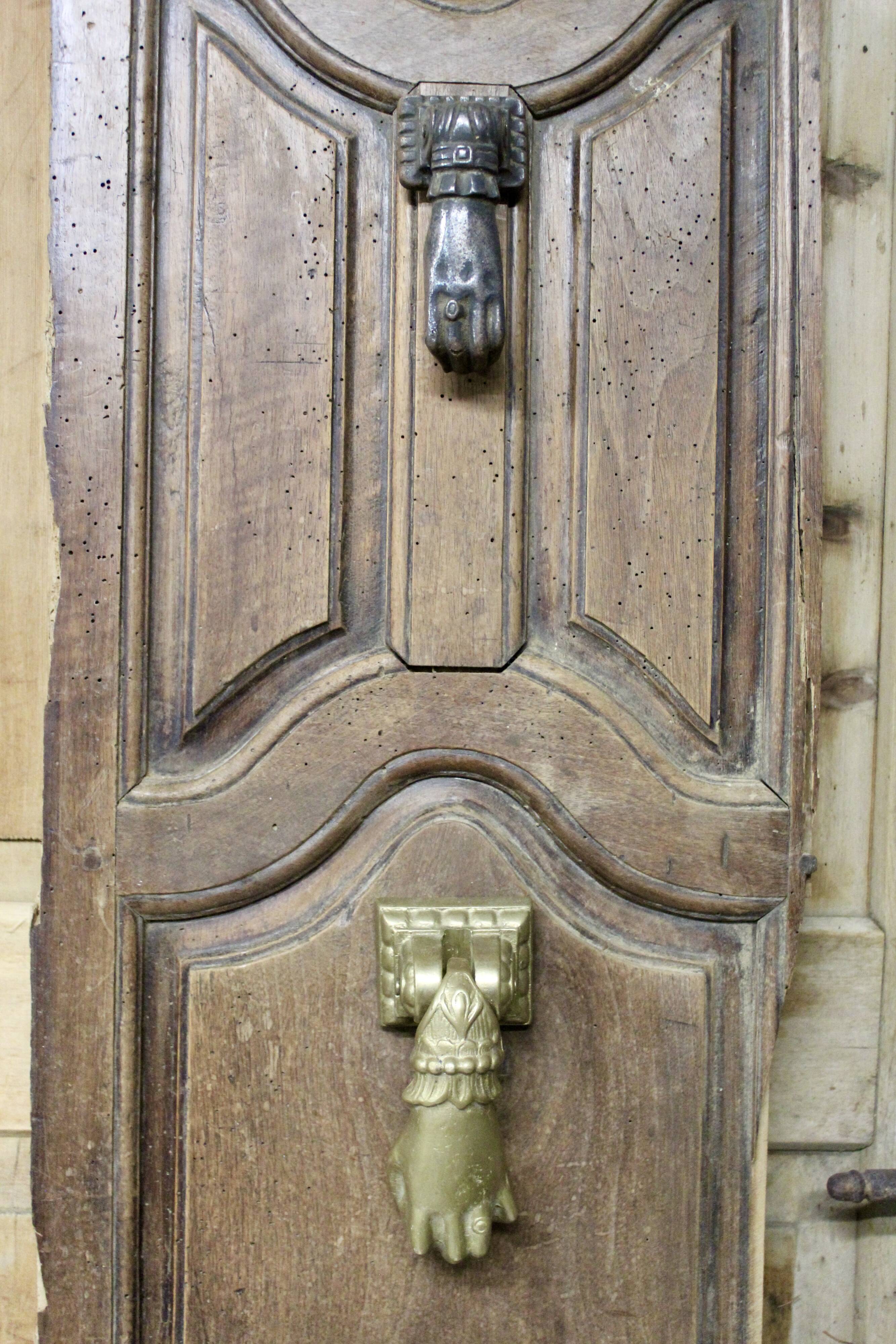 Solid bronze door knocker, hand shape, 19th century