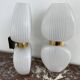 Pair of vintage wall lights from the 60s-70s in striped opaline glass and gilded brass.