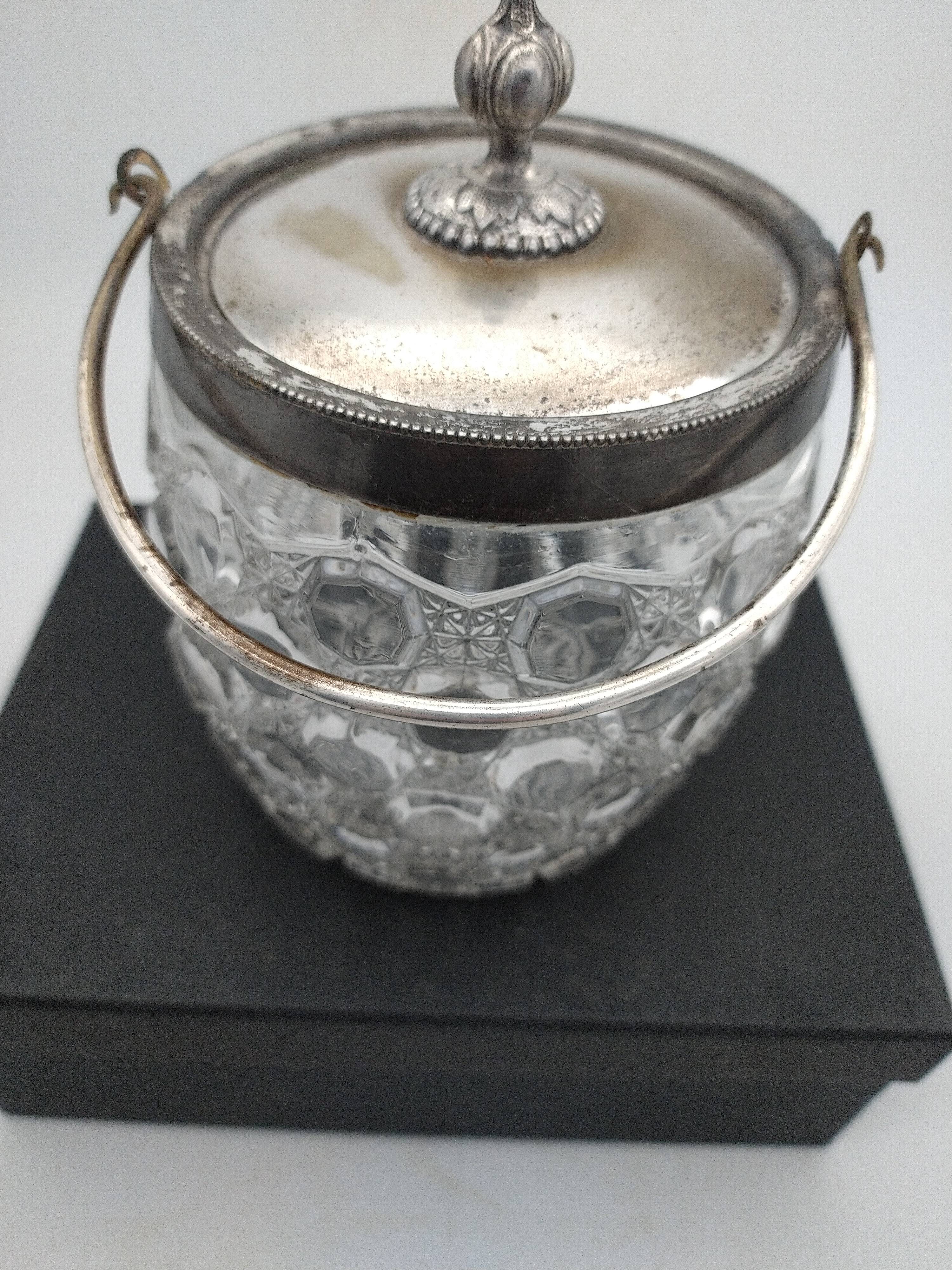 Biscuit, ice cube or candy pot, made of crystal and metal.