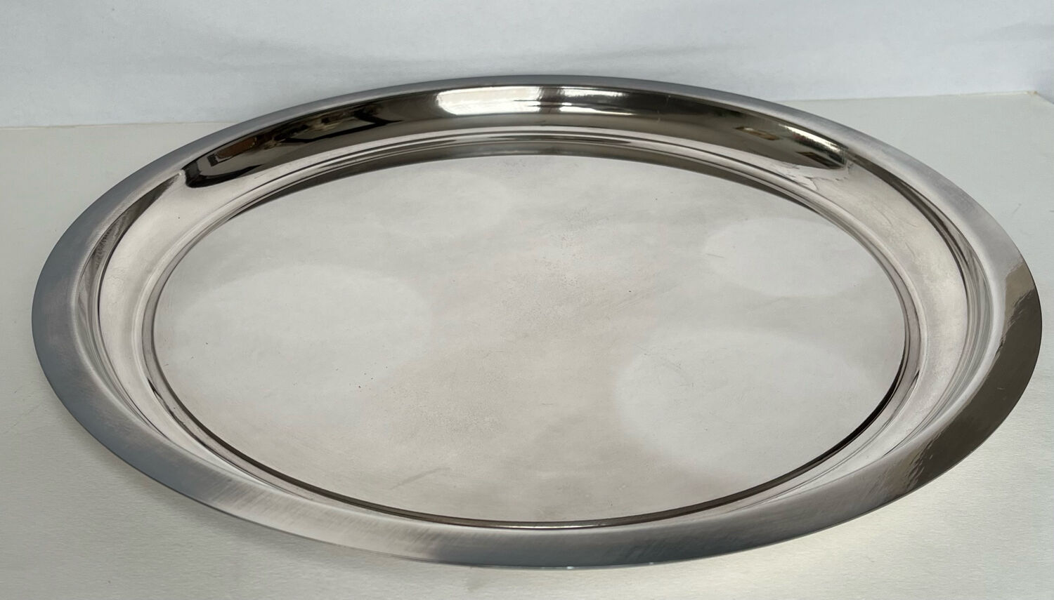 Circular silver metal tray