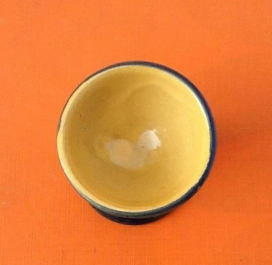 Antique glazed terracotta egg cup