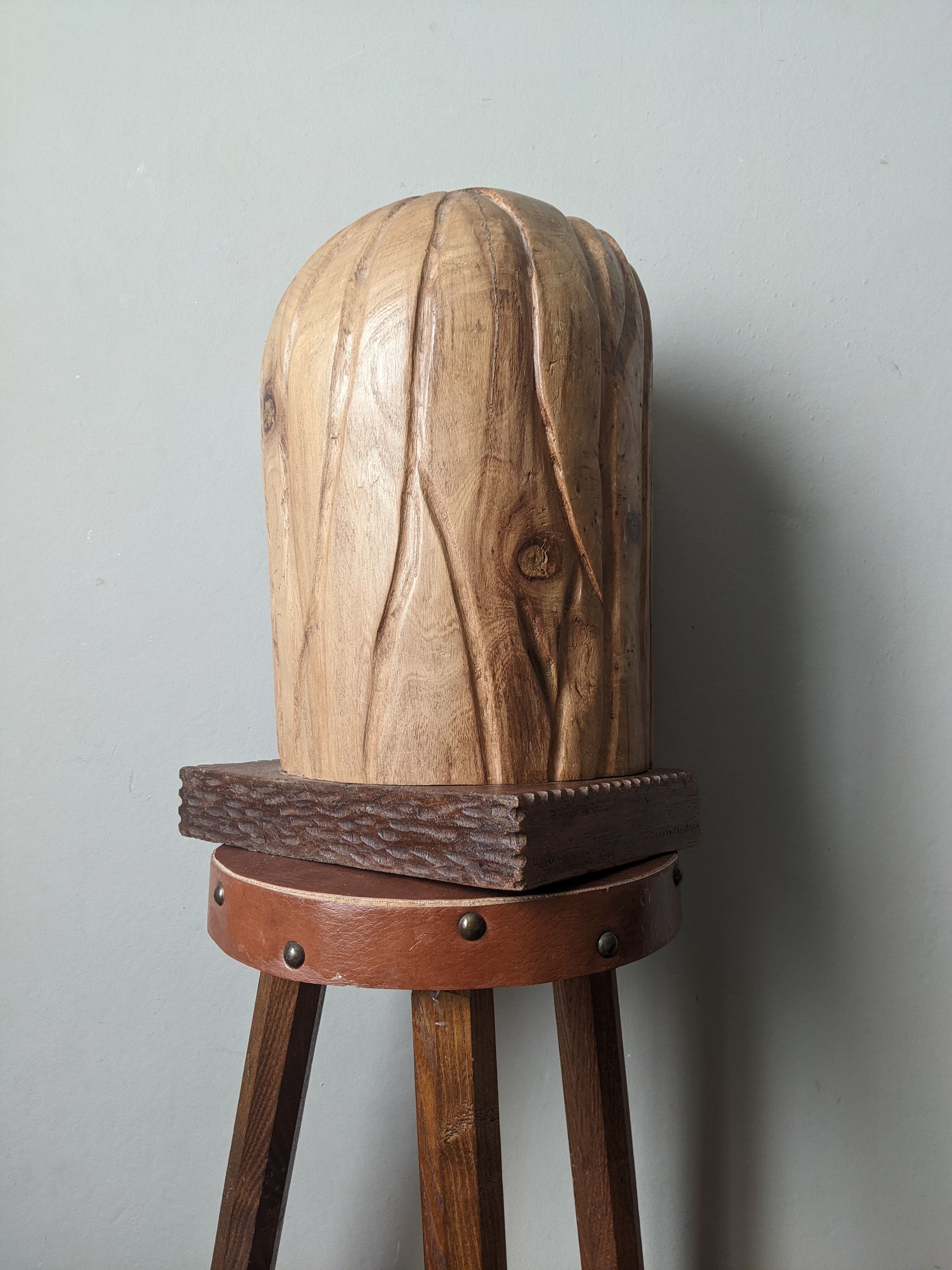 Handcrafted sculpture of the head of Christ in elm.