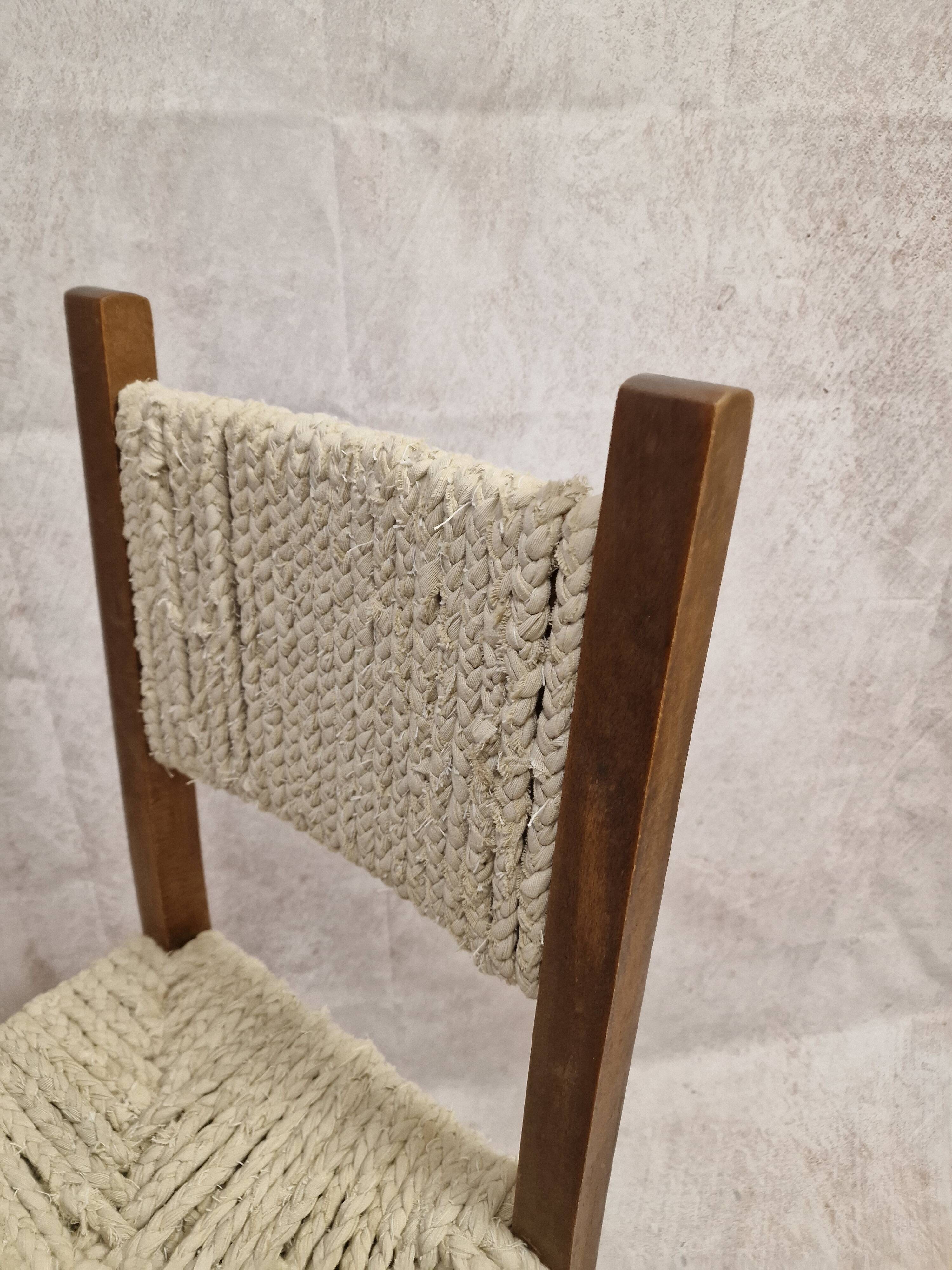 Wooden chair with woven rope seat