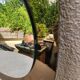 Vintage smoked bronze wall mirror, free form, 1970s – 70 x 55 cm