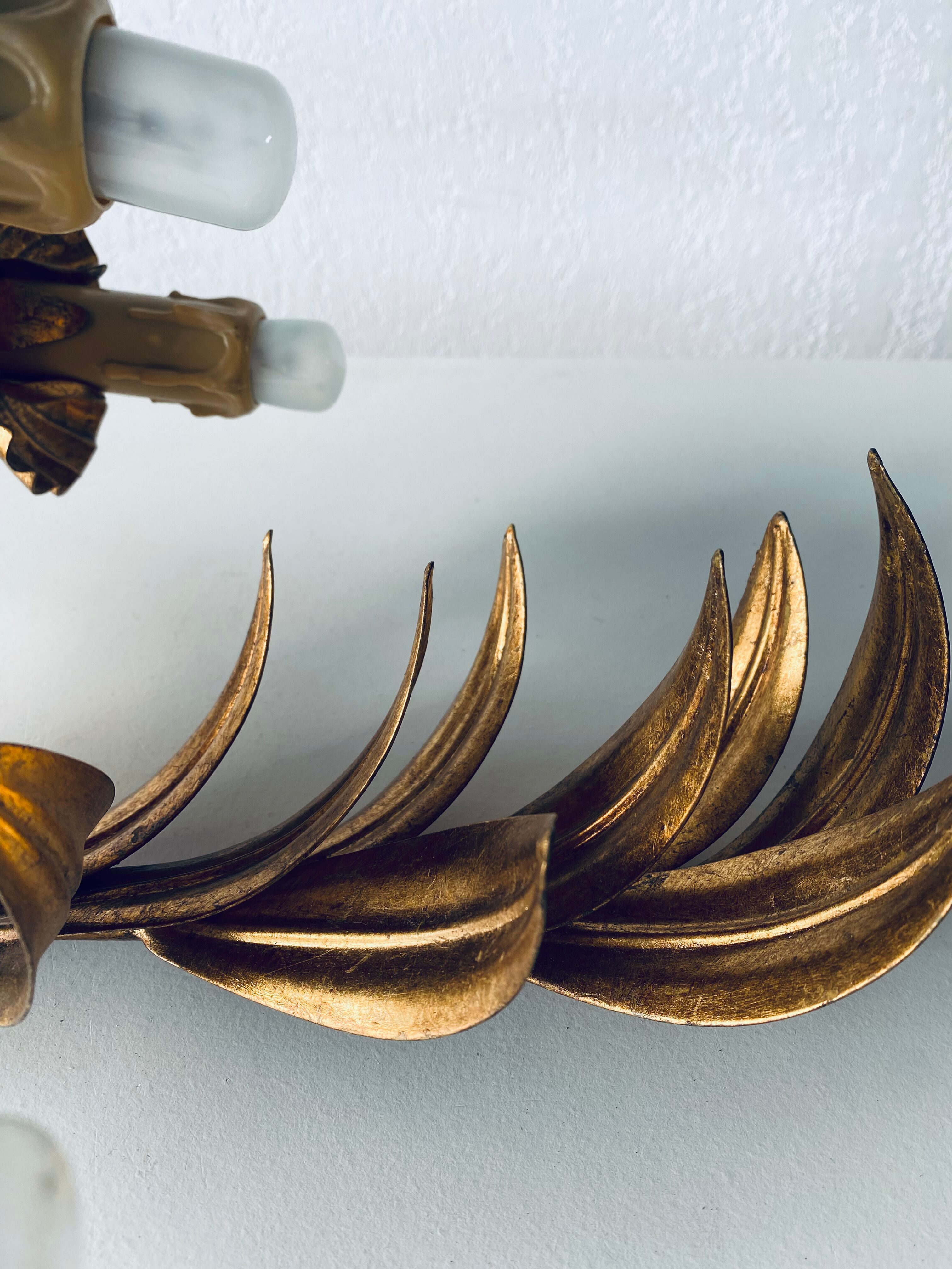 Golden leaf wall light