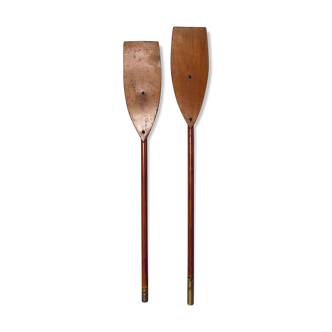 Pair of old oars in mahogany