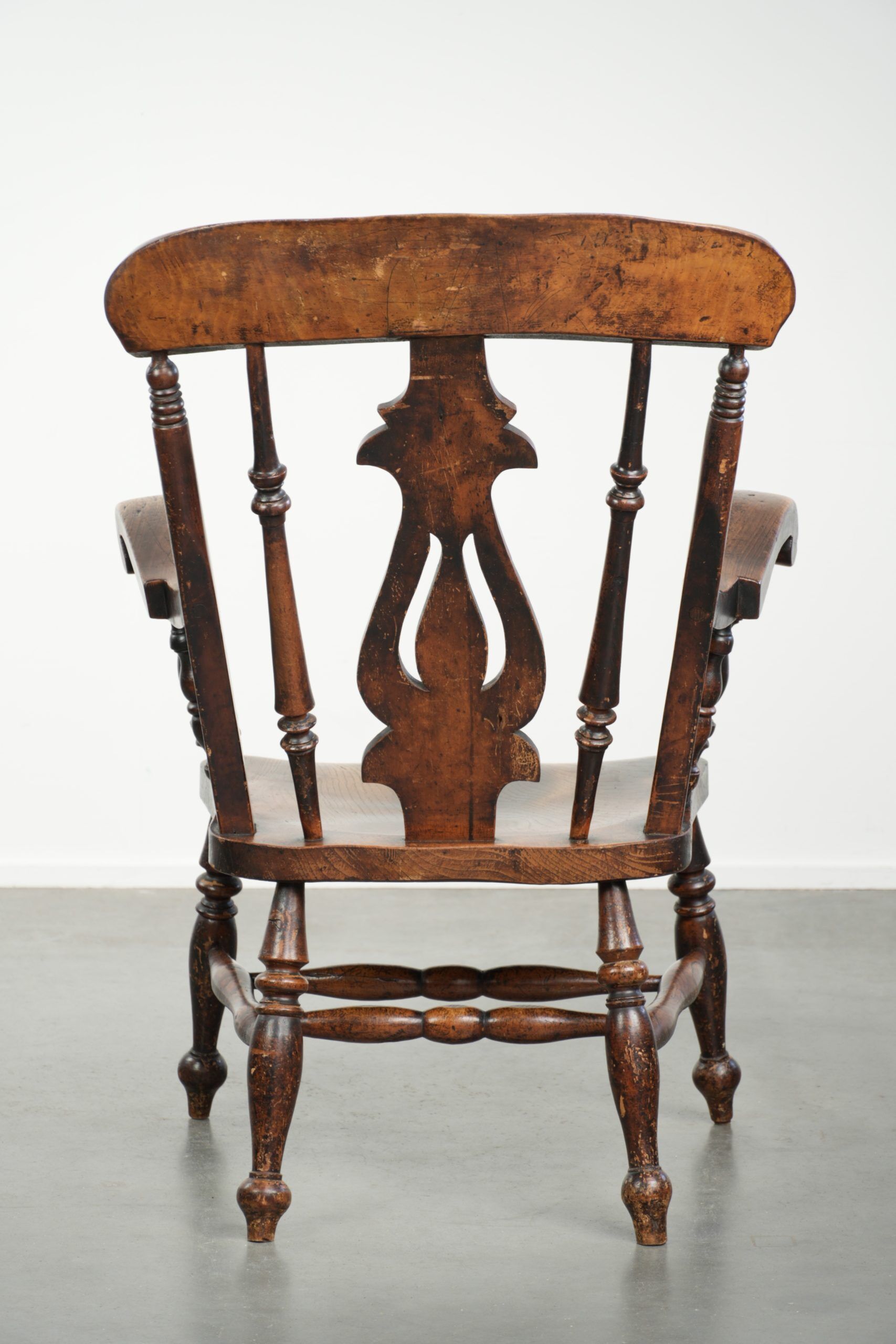 Antique English Windsor spindle chair from the early 19th century