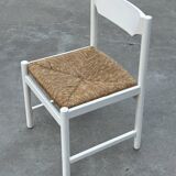 Vintage chair with wicker seat, minimalist design