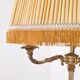 Golden floor lamp with pleated shade – Mid 20th century