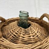 Demijohn type canister covered in wicker