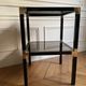 Pair of vintage metal and smoked glass side tables