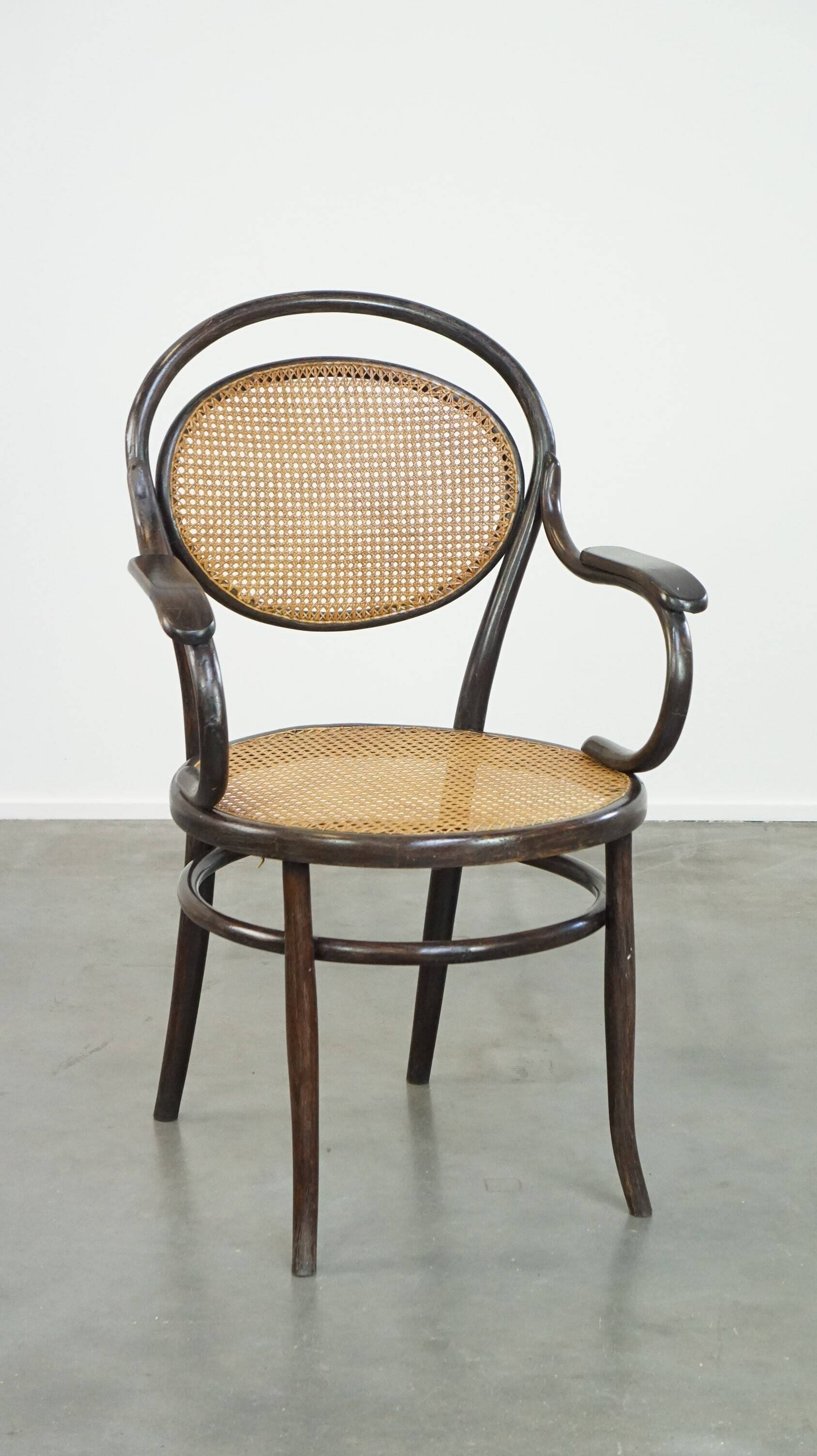 Very charming, elegant, vintage bentwood design bistro chair with comfortable armrests