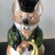 Ceramic jug representing a fox in hunting attire date 1986