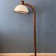 Mid-century floor lamp in brown wood by Steinhauer with an acrylic glass shade.