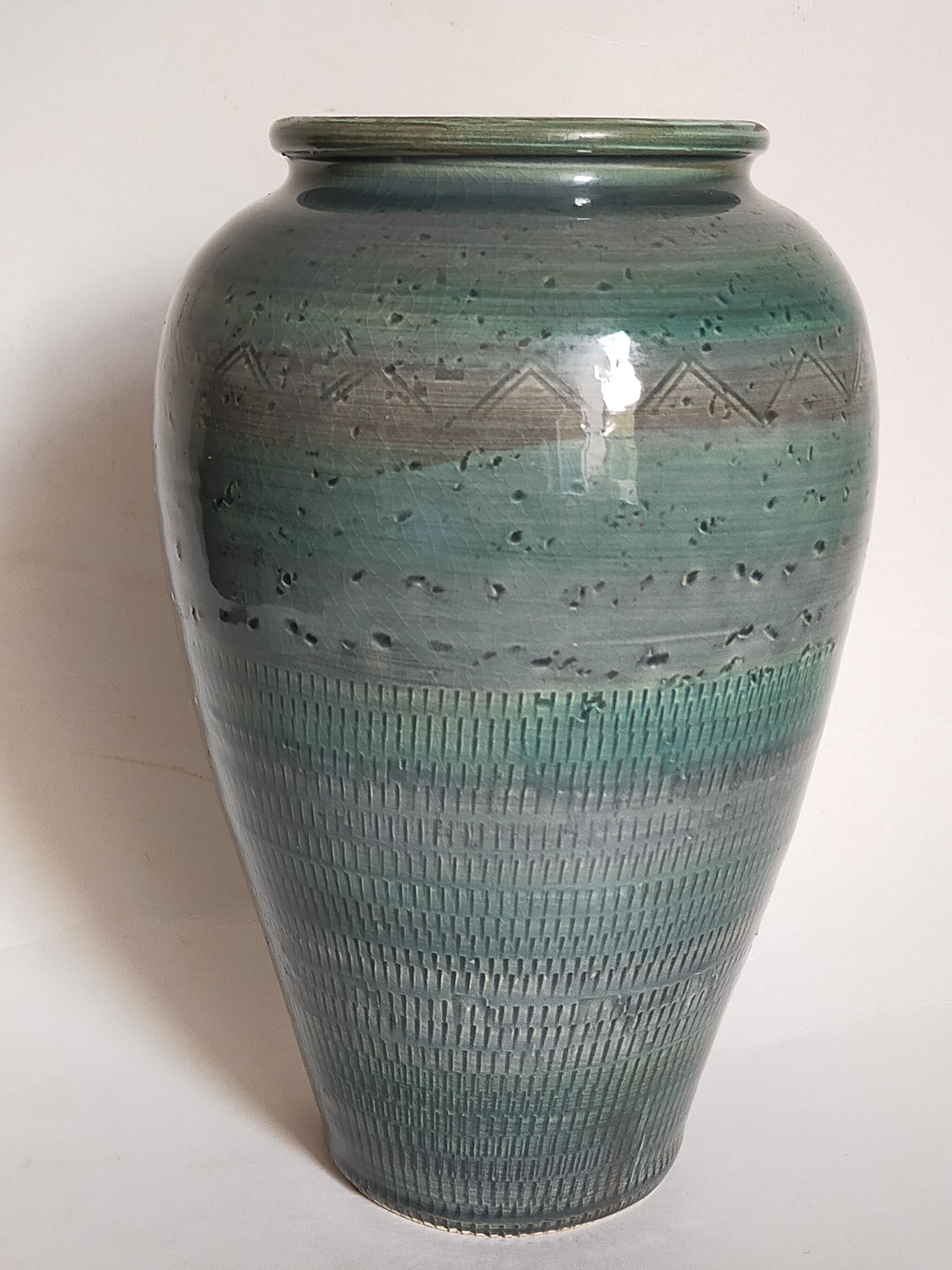 Oblong ceramic vase sacrificed with blue enamel