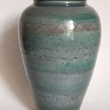 Oblong ceramic vase sacrificed with blue enamel