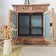 Buffet parisien bas ancien en bois patiné - intérieur fleuri