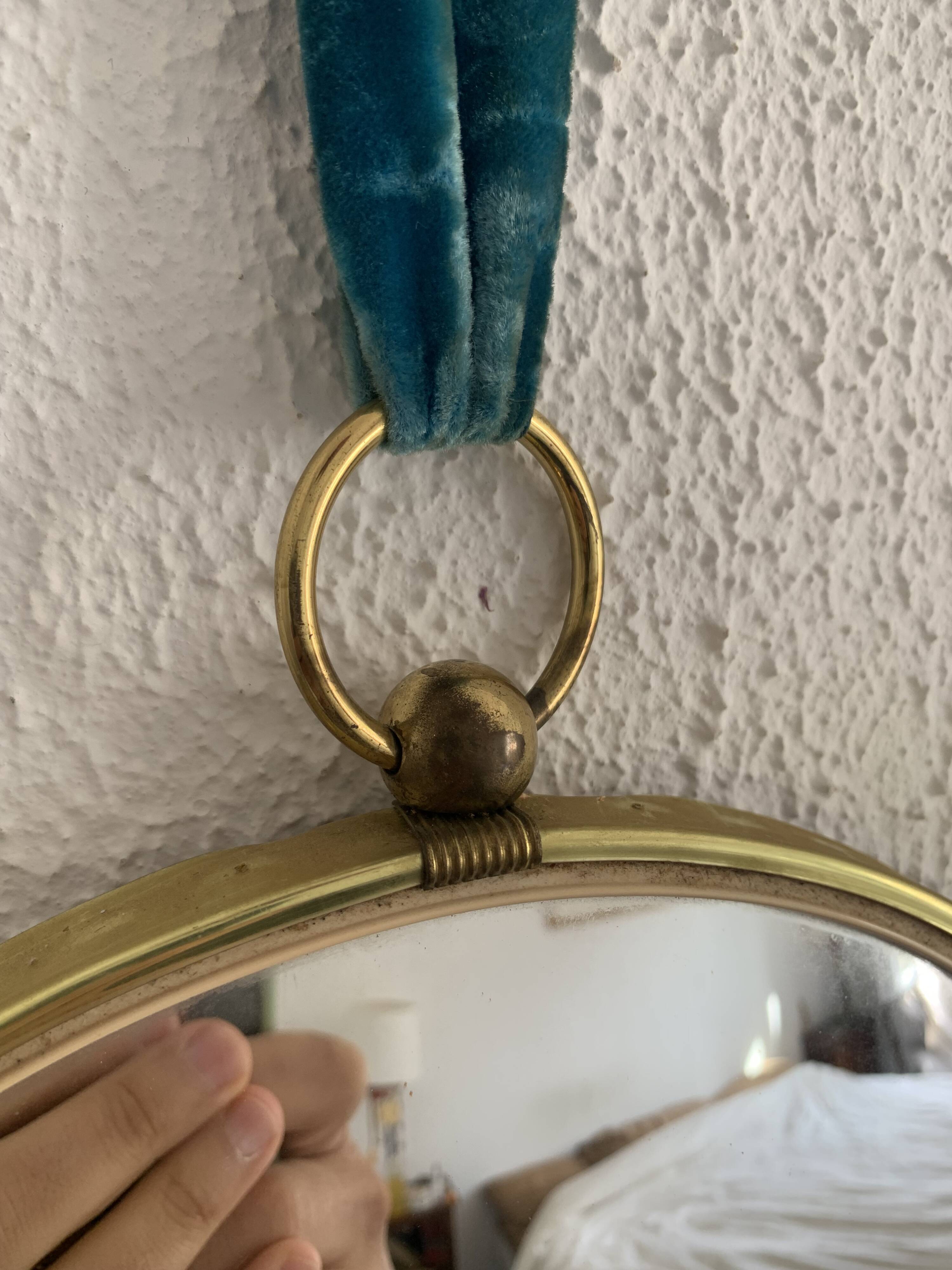 Vintage 1960s witch's eye mirror, turquoise velvet, sunburst effect - 24 x 54 cm