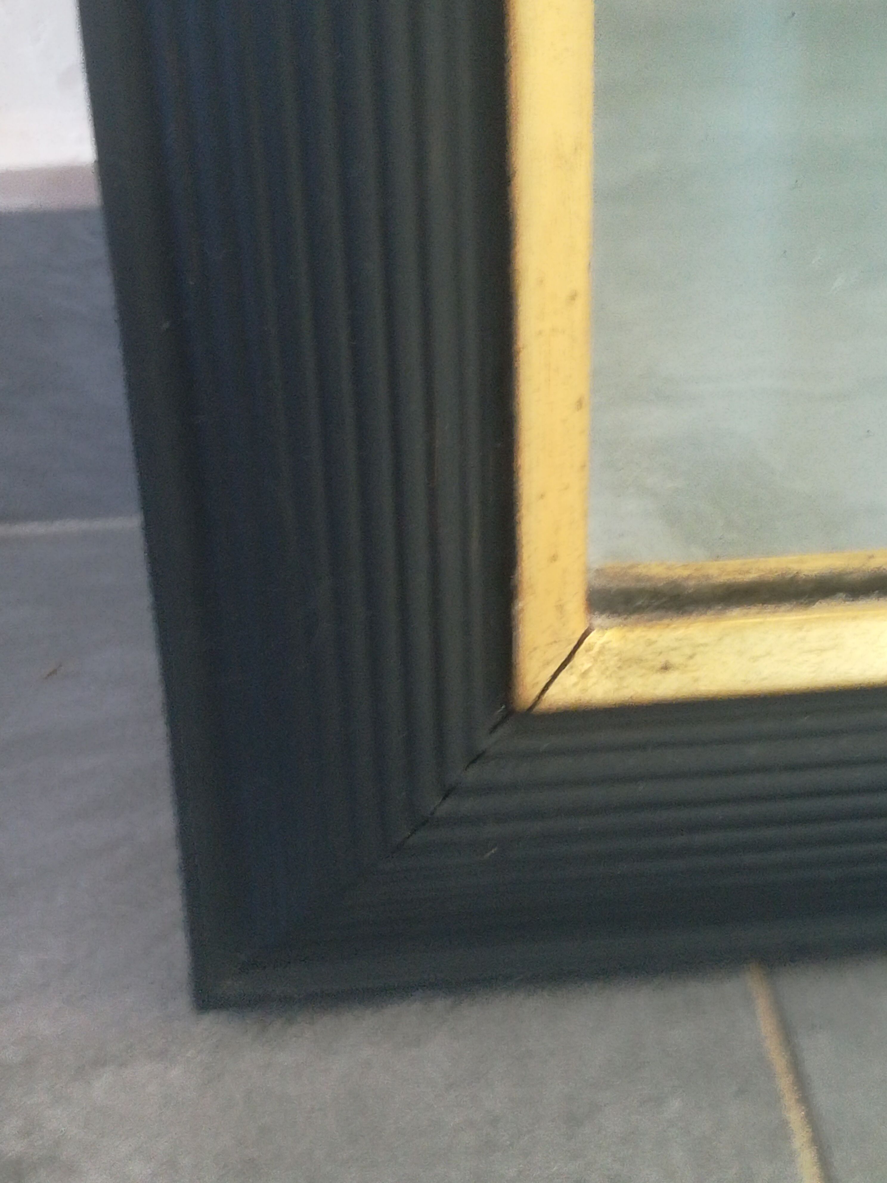 Trumeau louis XVI style mirror in black and gold stucco