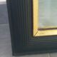 Trumeau louis XVI style mirror in black and gold stucco