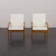 Pair of Kai Kristiansen Paperknife lounge chairs in teak and natural wool