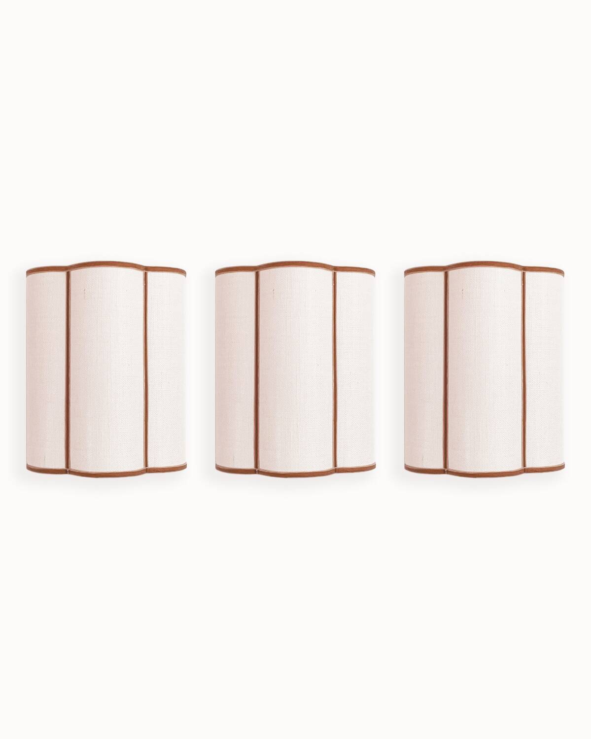 3 linen and velvet braid wall lights