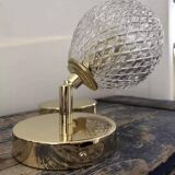 Pair of chiseled globe wall lights