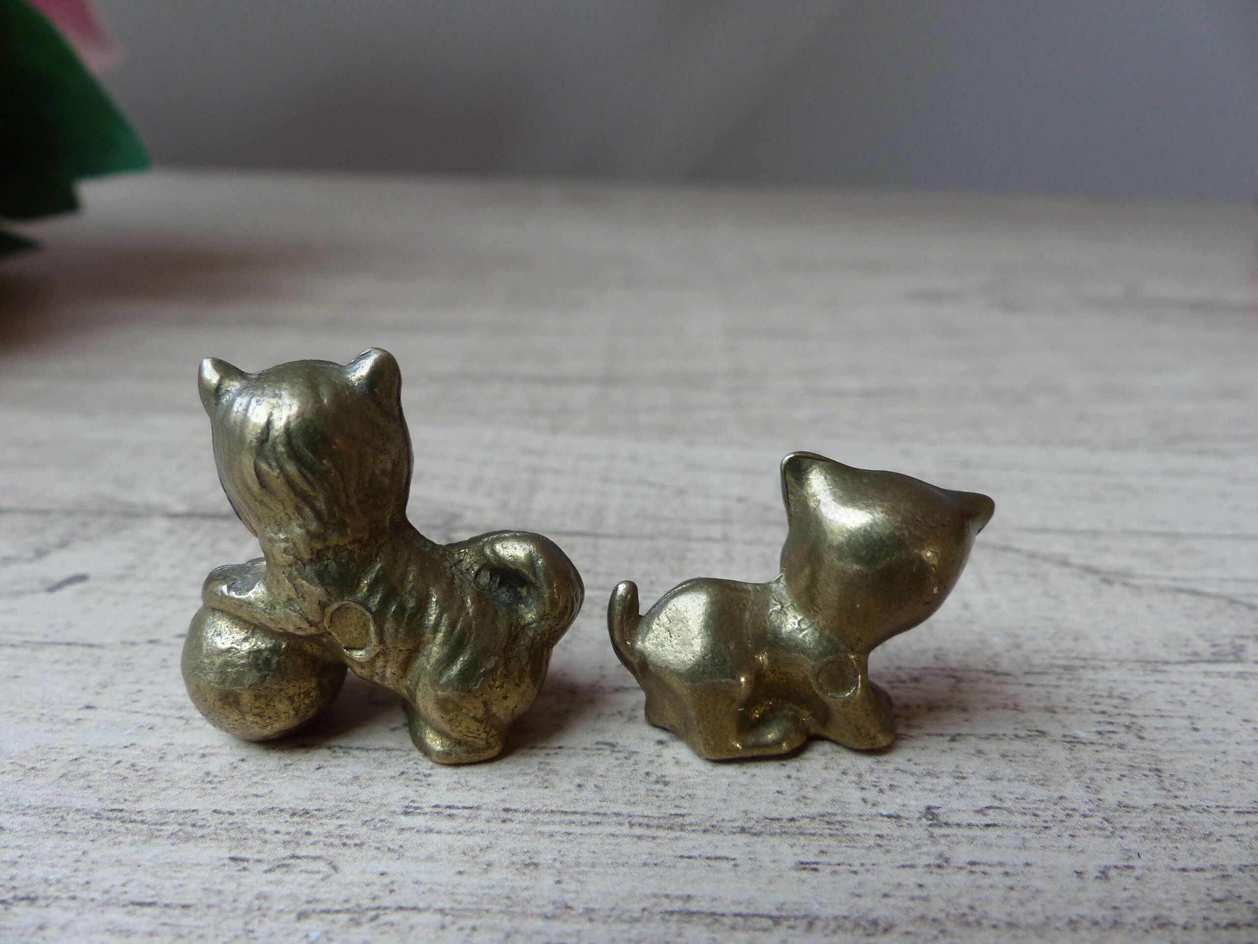 Duo of brass cats