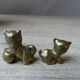 Duo of brass cats