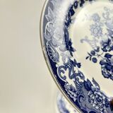 Set of 8 blue earthenware dinner plates with floral and bird decoration, 20th century