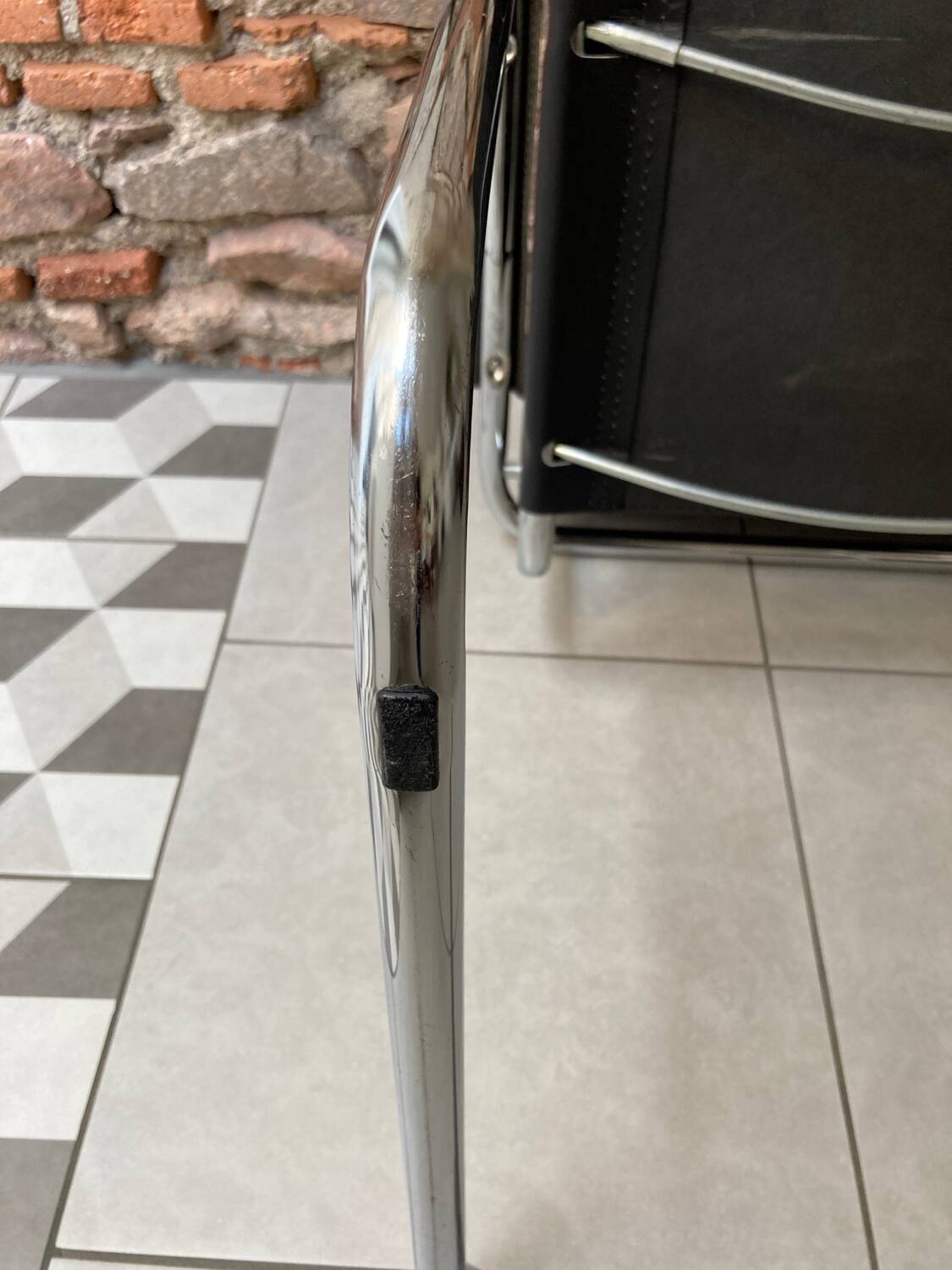 Chrome and black leather armchair type B34