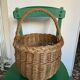 Round wicker basket in a bohemian style.